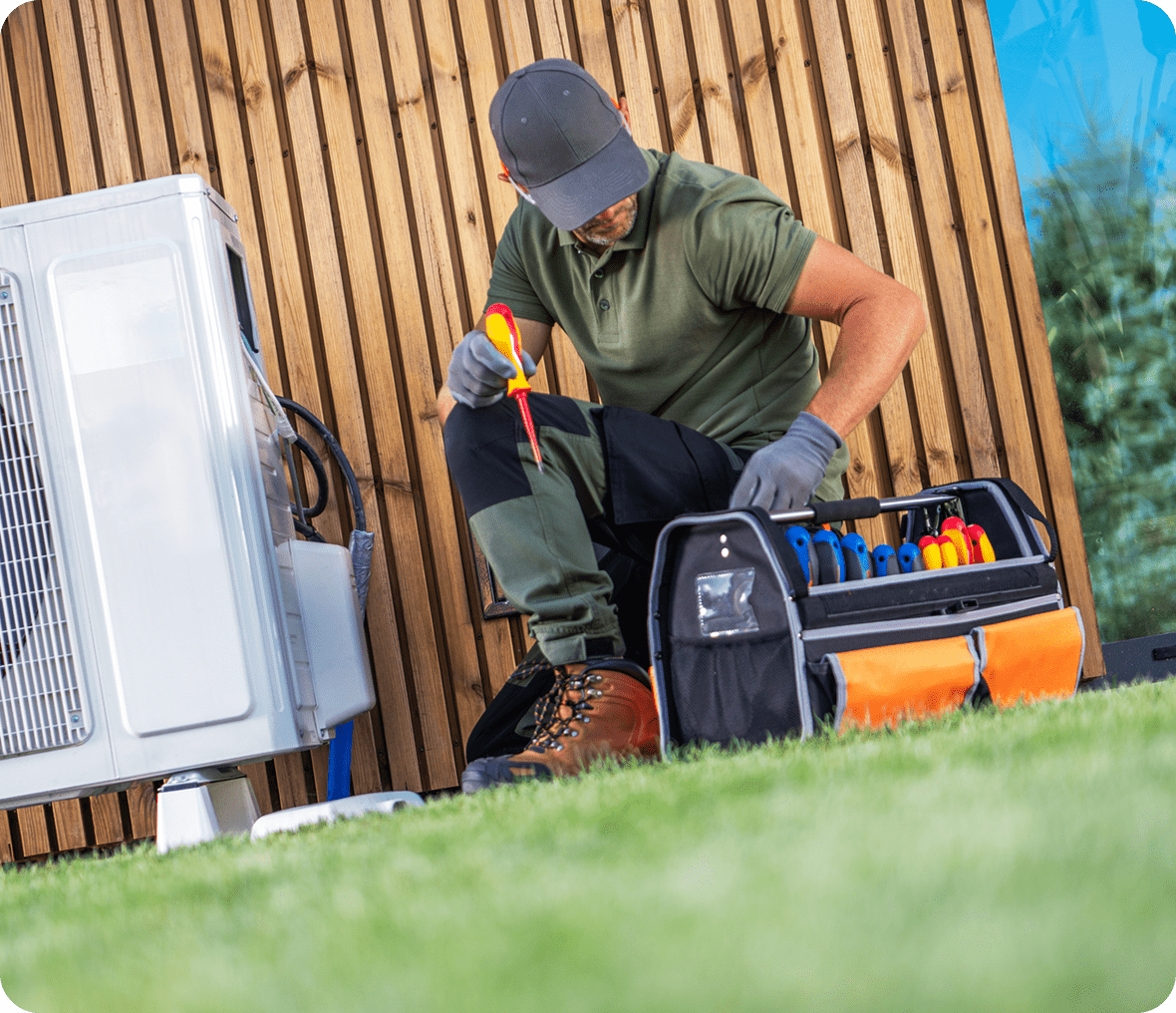 HVAC professional at work with tools
