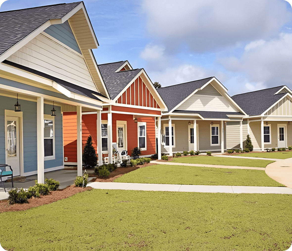 Row of vibrant homes under blue sky